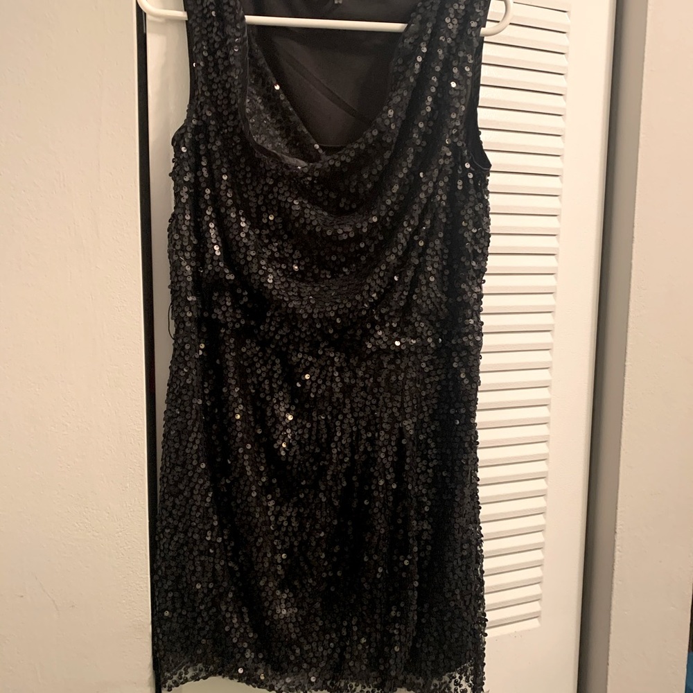 Black sequins mini dress.